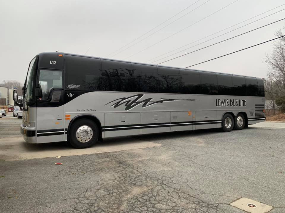 Motorcoach &mdash; silver and black script