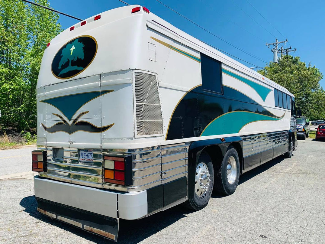 Converted motorcoach &mdash; teal and white