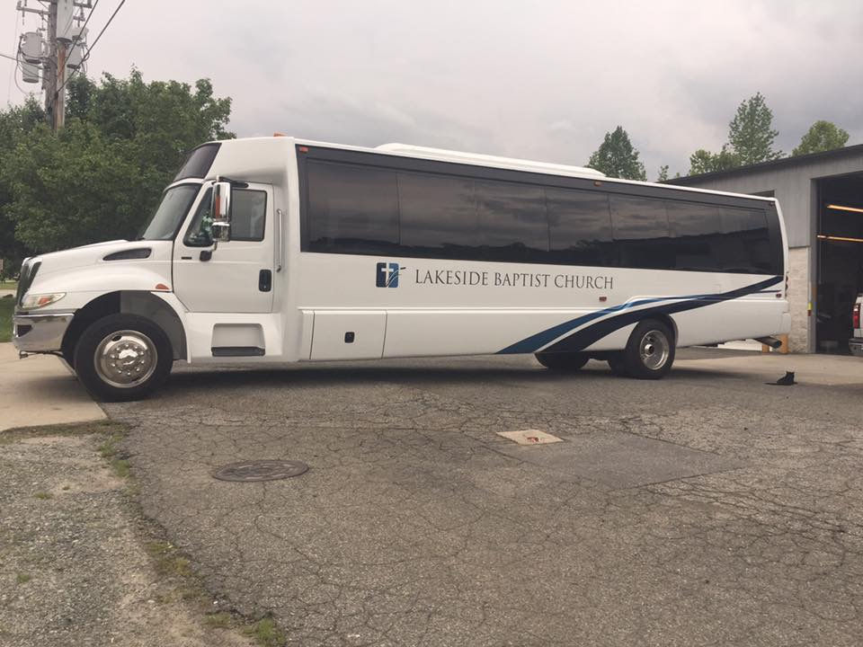 Shuttle bus with decal lettering