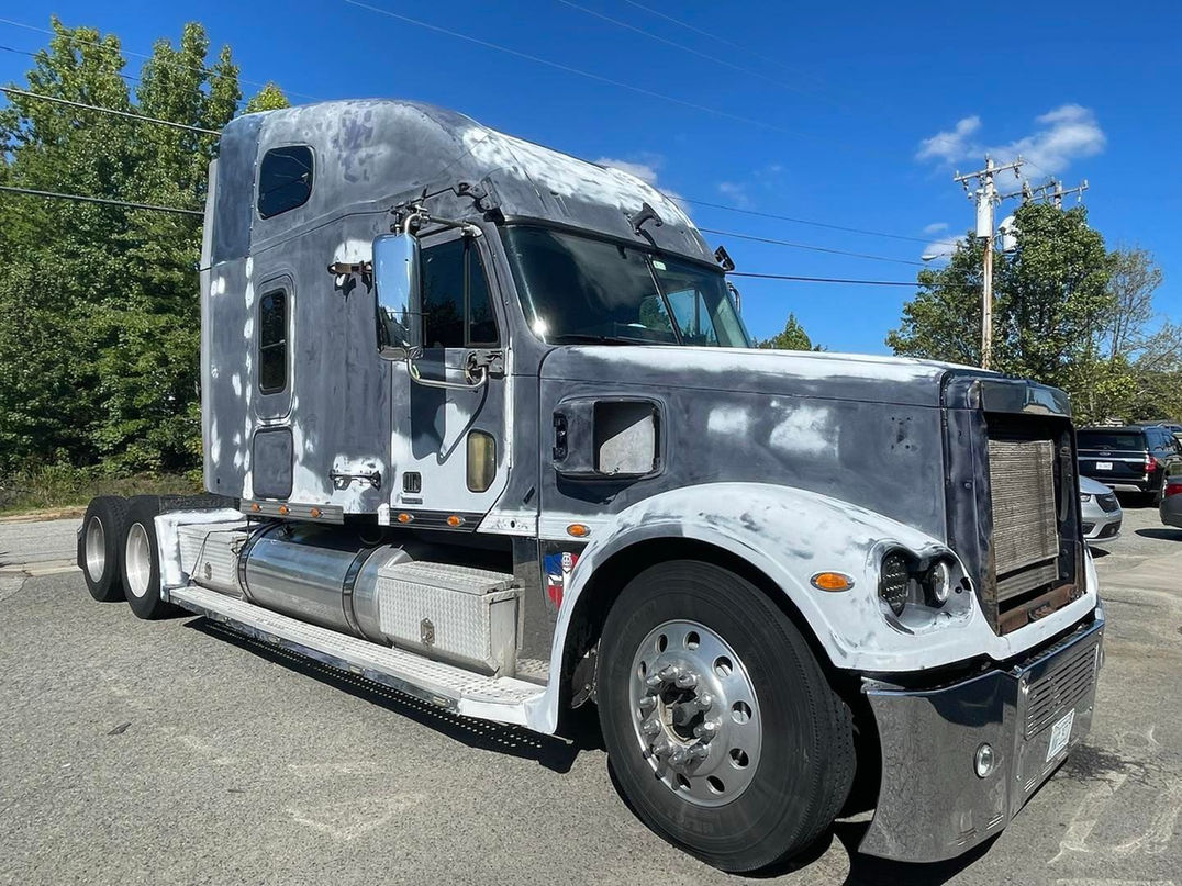 Semi cab in bare-metal prep