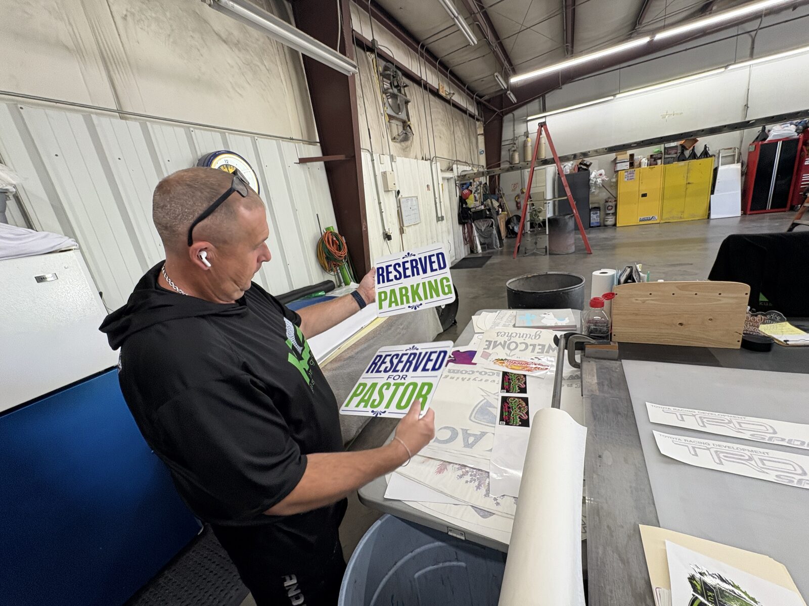 Custom reserved parking signs being made