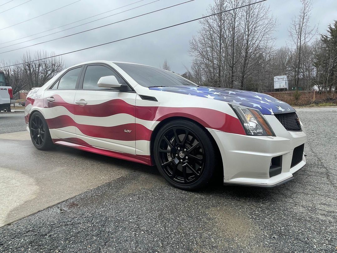 Flag-wrapped Cadillac